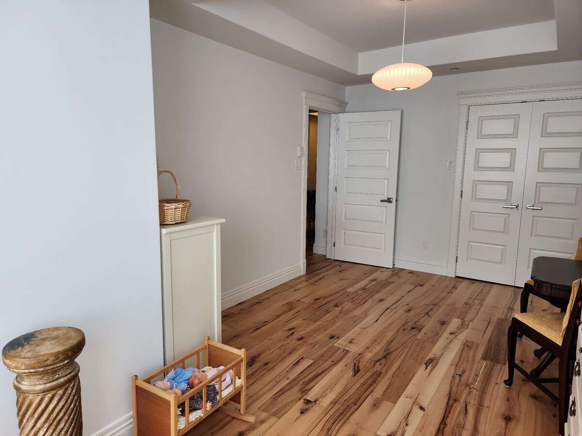 Secondary Room Closet with bulit-in organizers, lighting in all closets.