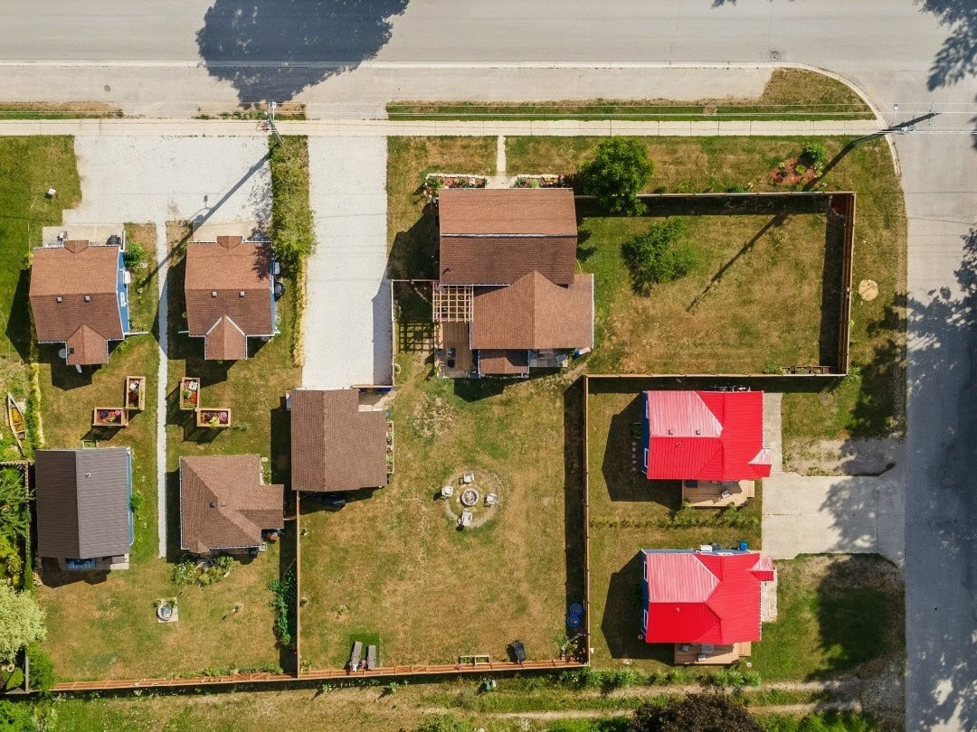 Arial shot of the property showing the Main House and Six Cottages