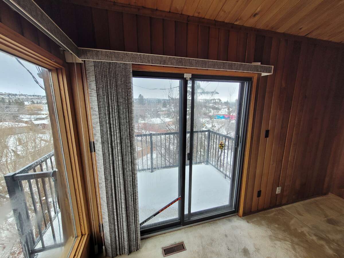 Second floor sitting room with newer balcony