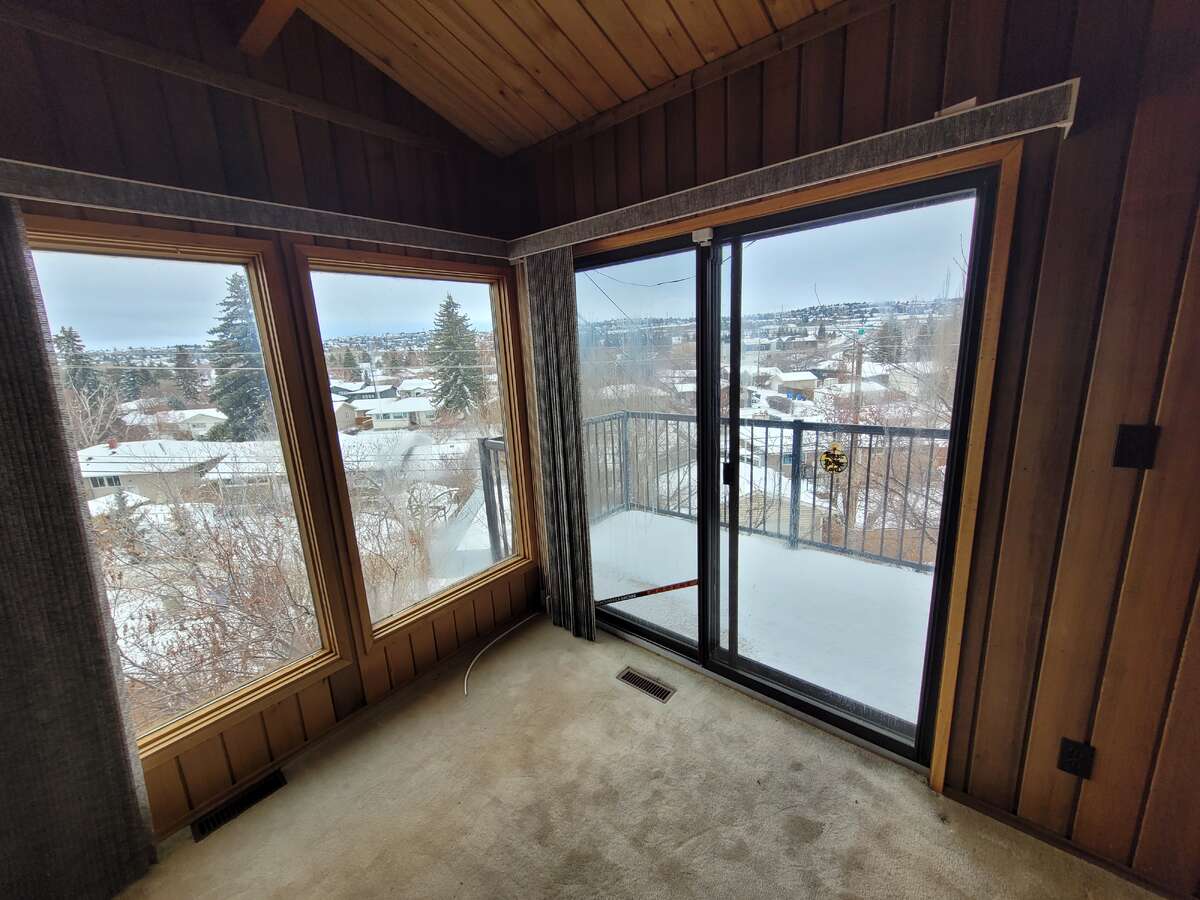 Second floor sitting room with newer balcony