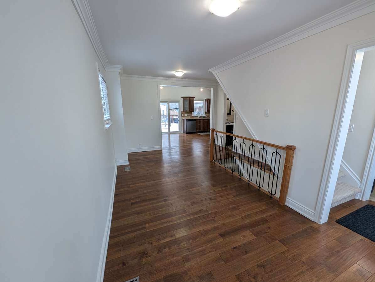 Living Room - Facing Kitchen and Back of House