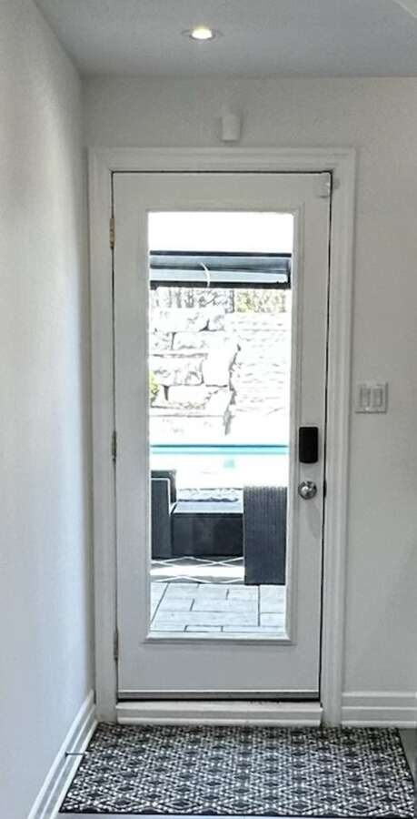 Full-glass French-Door leads to Backyard Oasis!