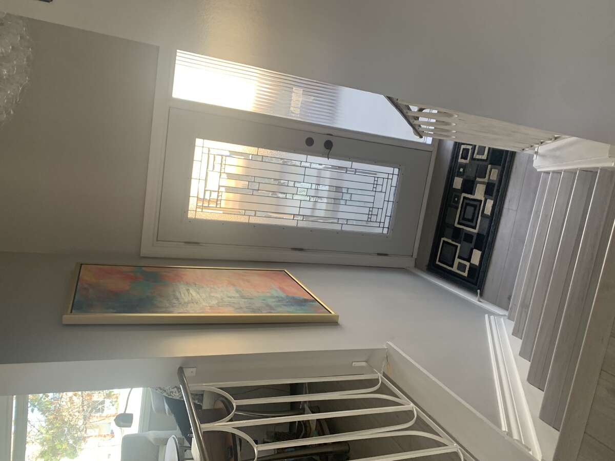 Front entrance stairway up to main level