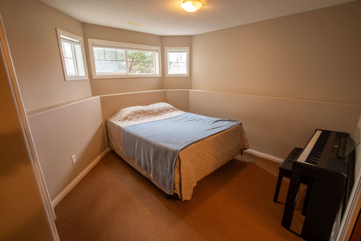 Bright and spacious basement bedroom with connection to basement bathroom