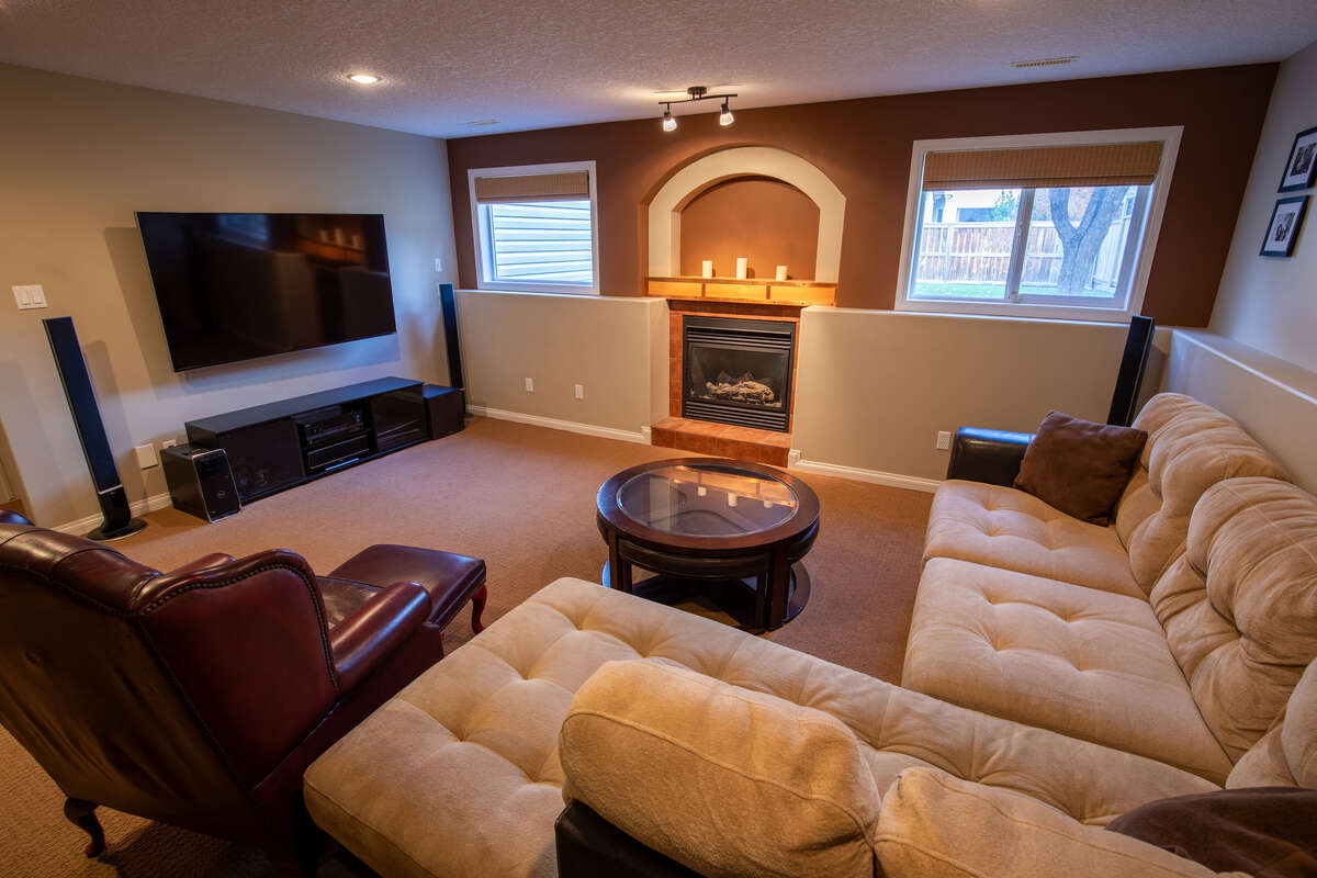 Bright, modern family room with natural gas fireplace