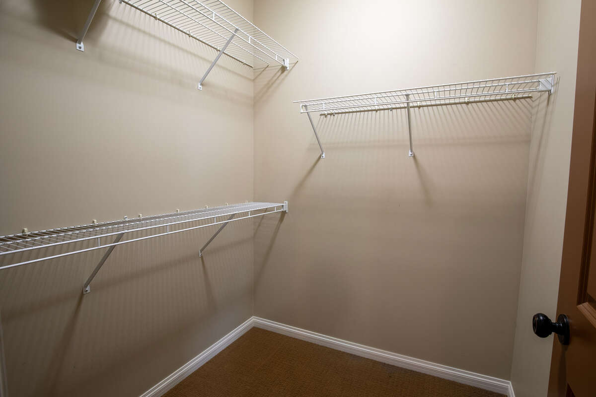 Spacious walk-in closet in primary bedroom