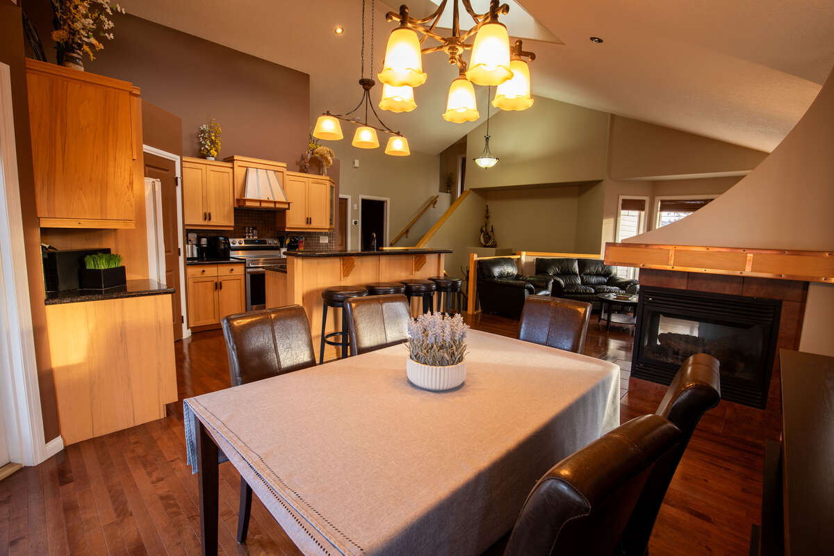 Corner view of main floor, skylights, gas fireplace and lighting fixtures