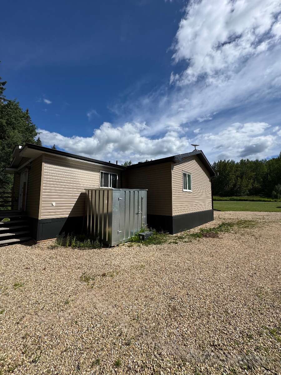 Rural Acreage With Spacious Home & Commercial Shop