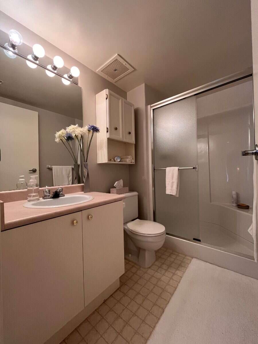 2 bedroom, top floor condo in Cook St Village