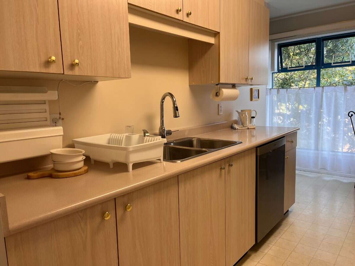 2 bedroom, top floor condo in Cook St Village