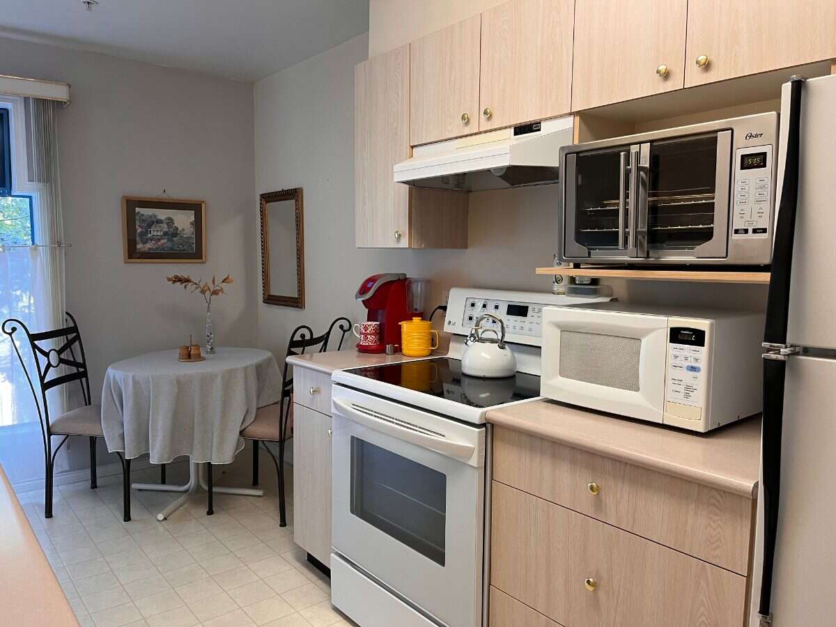 2 bedroom, top floor condo in Cook St Village