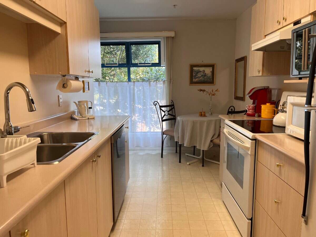 2 bedroom, top floor condo in Cook St Village