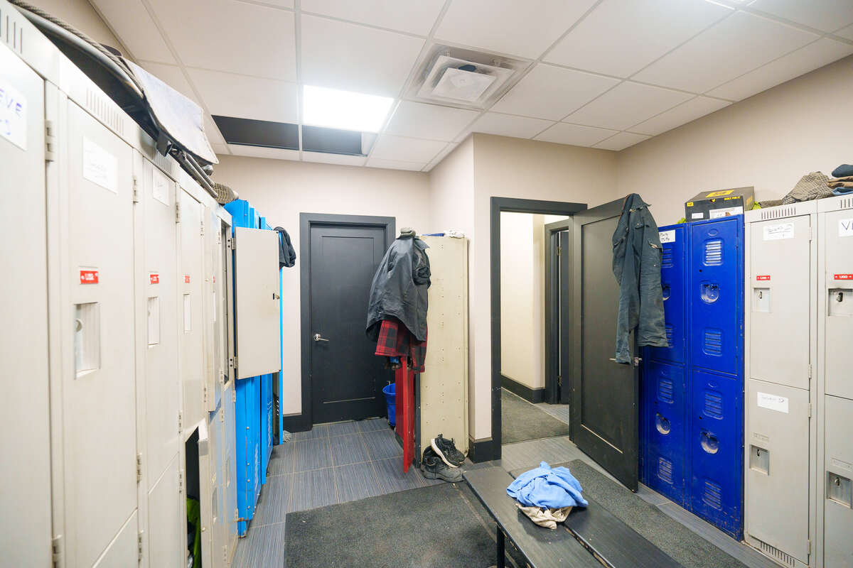 Lockroom bathroom and shower through the closed door