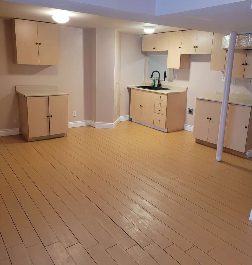 Basement unit Kitchen area, ample room for Kit Table and chairs.