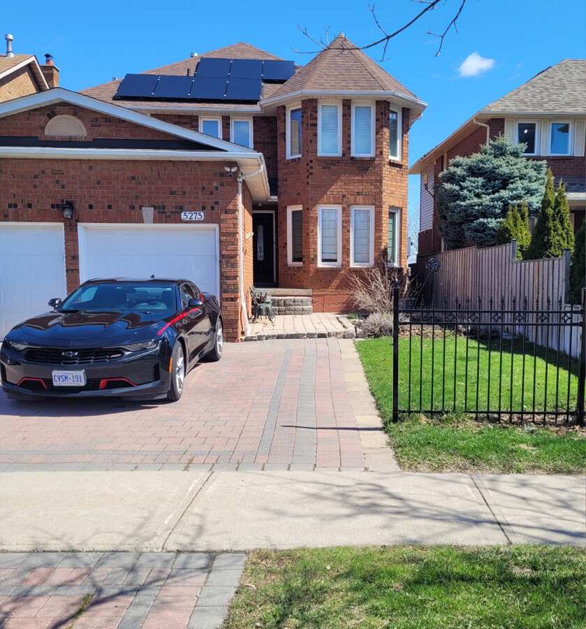 View of front Solar Panels owned - Approx only $400 all yr for Hydro - net meter save lots of money