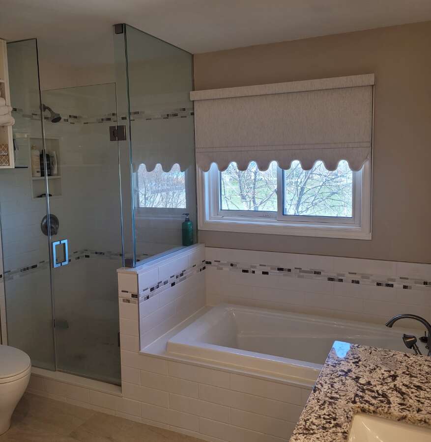 Master bed rm ensuite tub and shower east exposure over looking backyard
