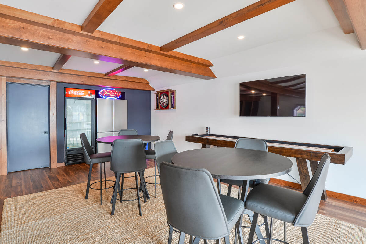 Entertainment Room High Tops, Darts, TV, Shuffle Board, Cooler and Fridge
