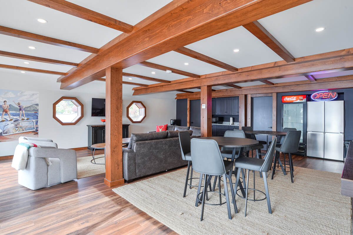 Entertainment Sitting Area and Two High Top Tables and Chairs