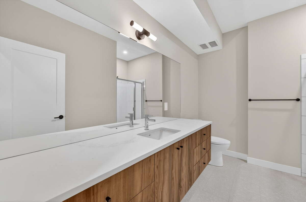 Lower level Full bathroom - Photos are of a similar model home, actual property may differ