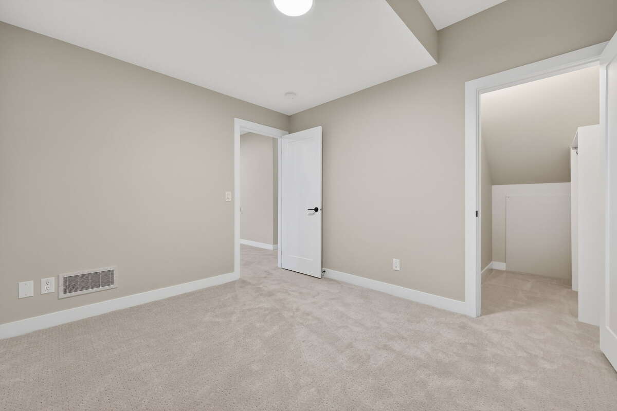 Bedroom 2 - Photos are of a similar model home, actual property may differ