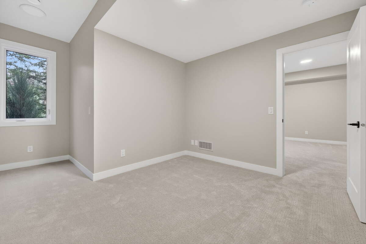Bedroom 2 - Photos are of a similar model home, actual property may differ