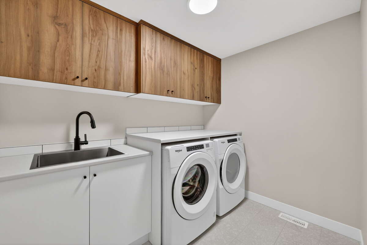 Laundry Room - Photos are of a similar model home, actual property may differ