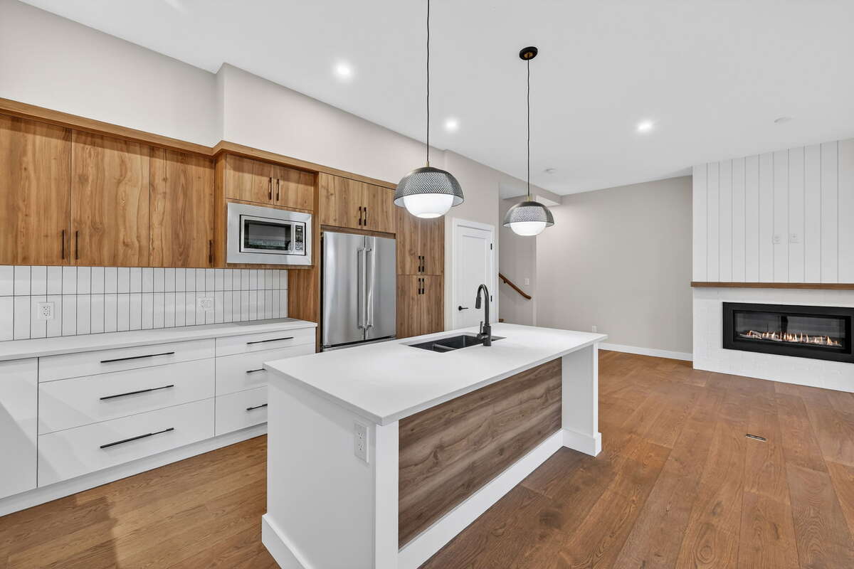 Kitchen - Living - Photos are of a similar model home, actual property may differ