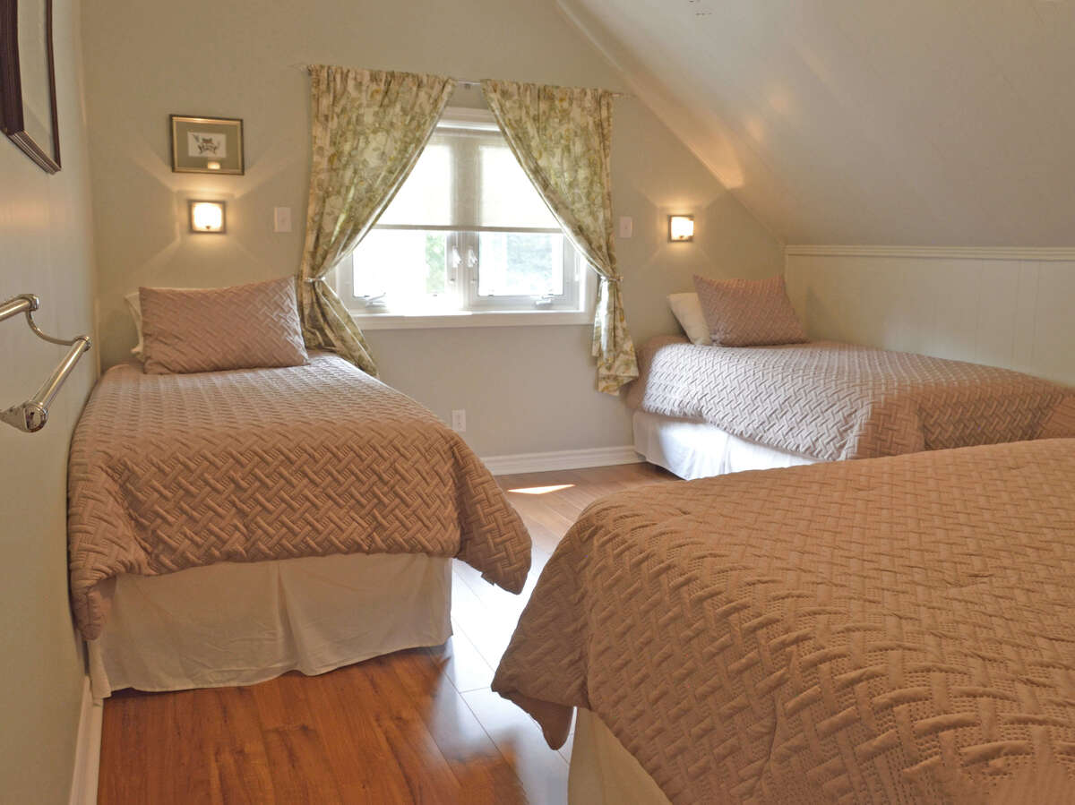 Bedroom 4; spacious enough to accommodate a queen bed and two singles. Think of the possibilities.