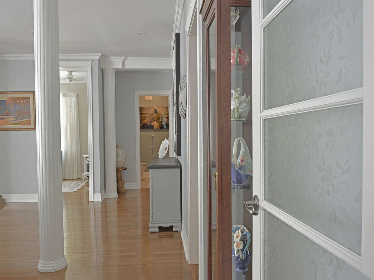 Each room on the main floor offers its own distinct space, yet feels spacious and open.