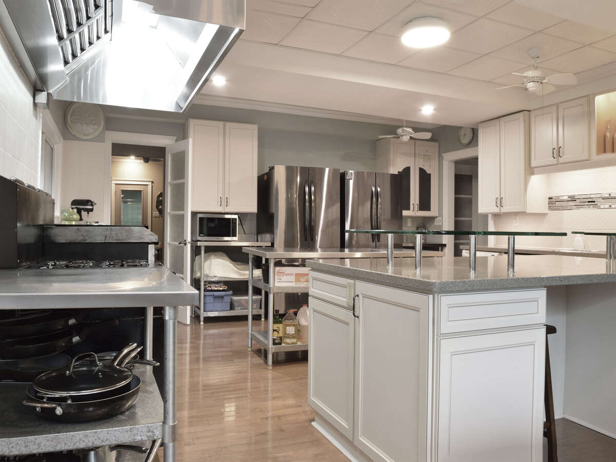 Ample counter space in the kitchen; stainless steel appliances, and a sleek modern design
