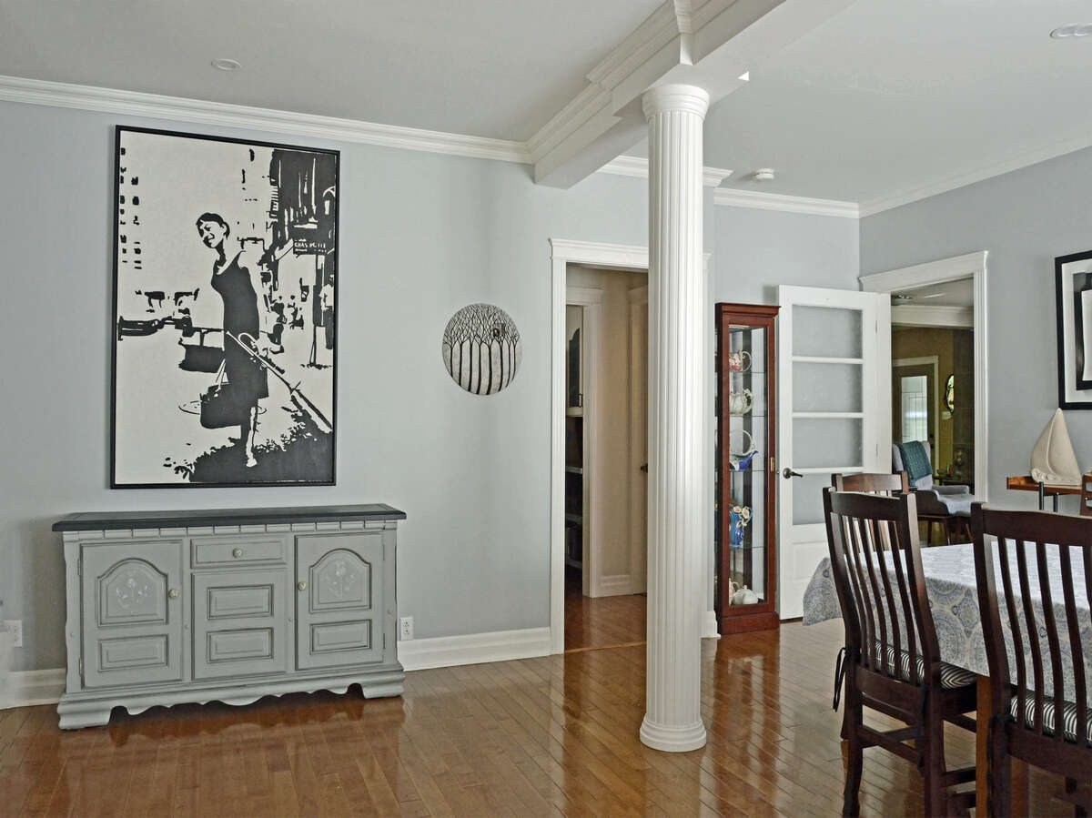 Another view of the dining room, leading seamlessly into the kitchen and living room areas.