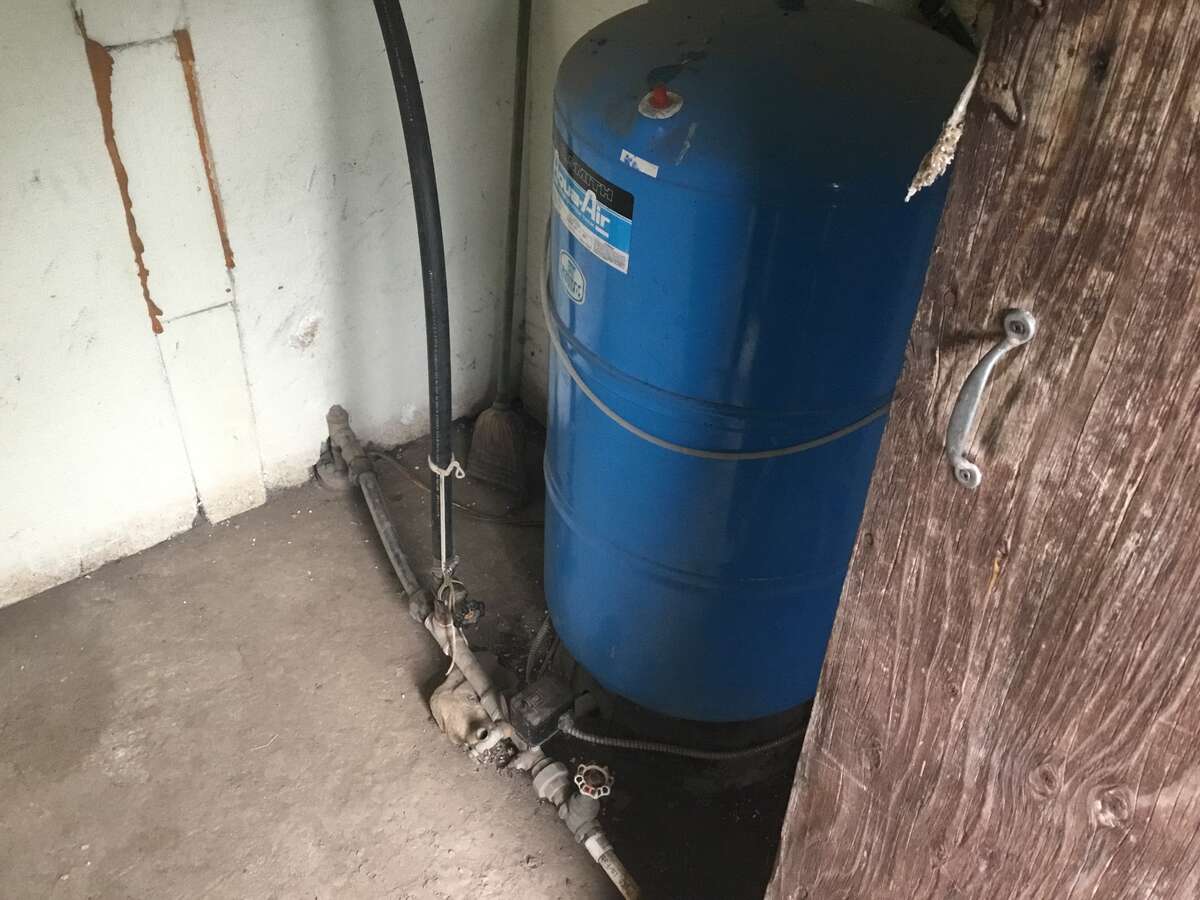 A simple and efficient system. The pump is 170 feet down.