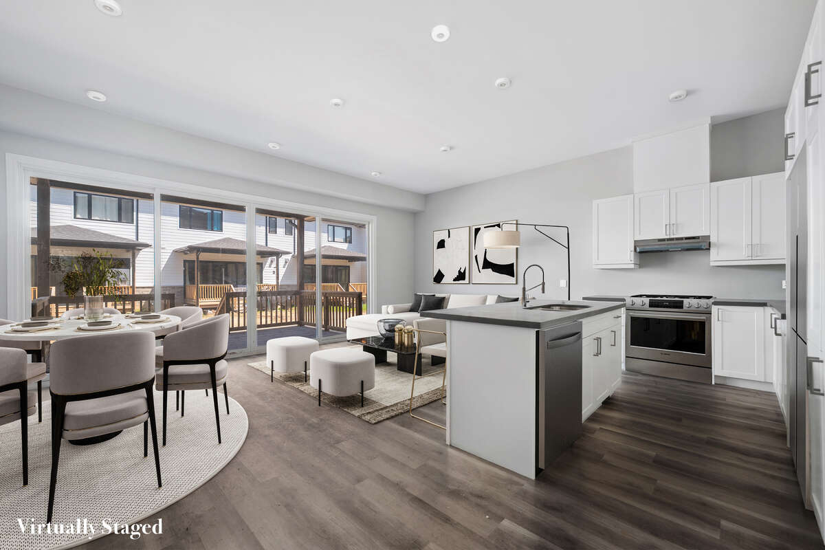 Virtually staged Living and kitchen rendering based on floor plan.