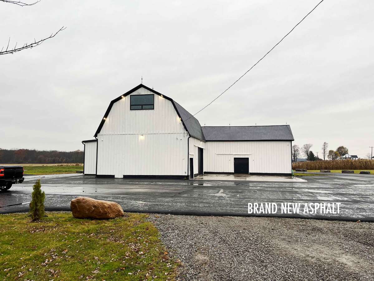 Enjoy the brand new asphalt driveway — a costly upgrade you won’t have to worry about.