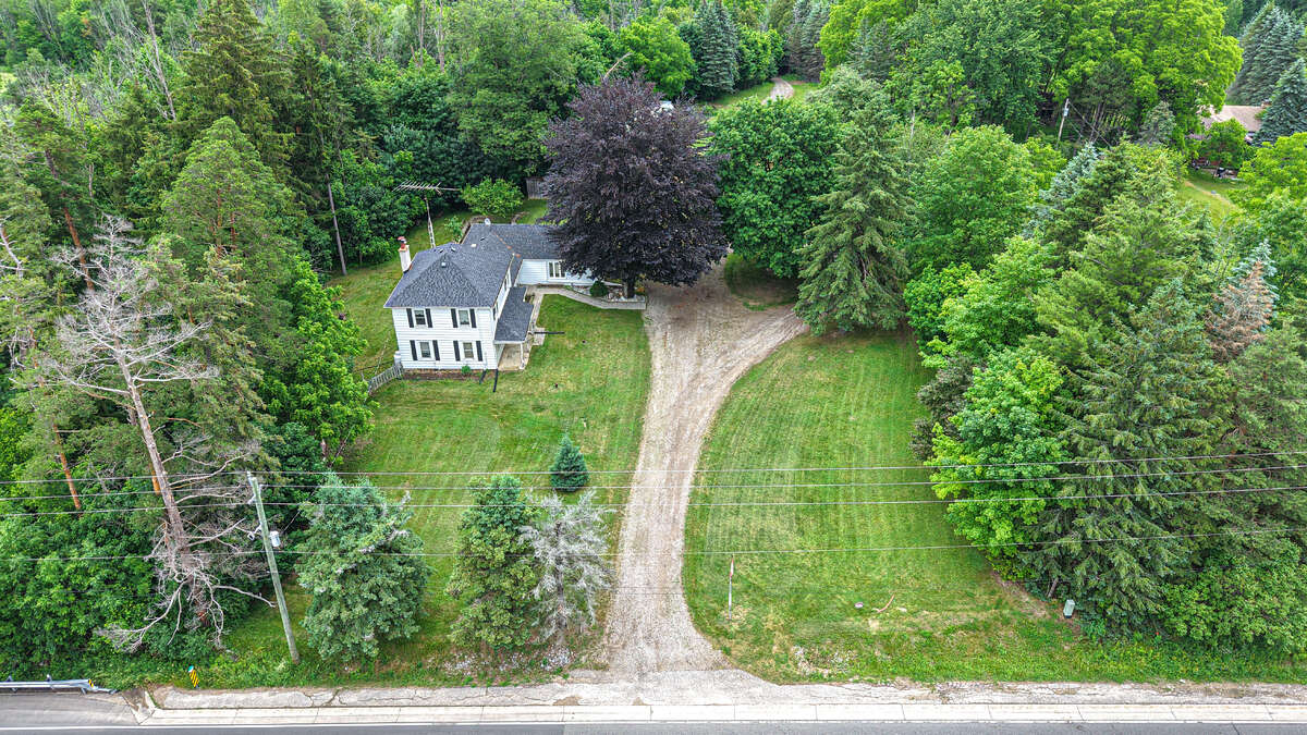 13 Acres with large farm house