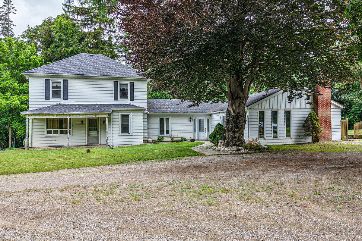 13 Acres with large farm house