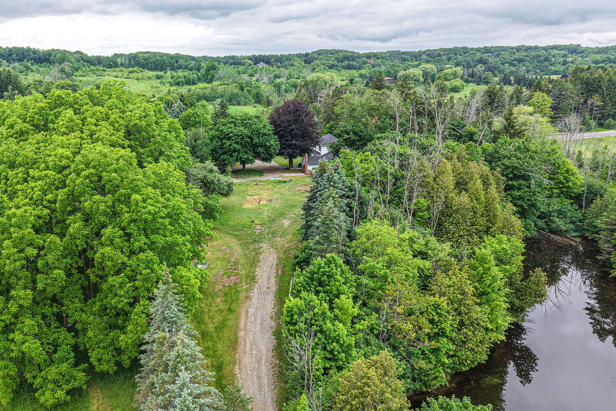 13 Acres with large farm house
