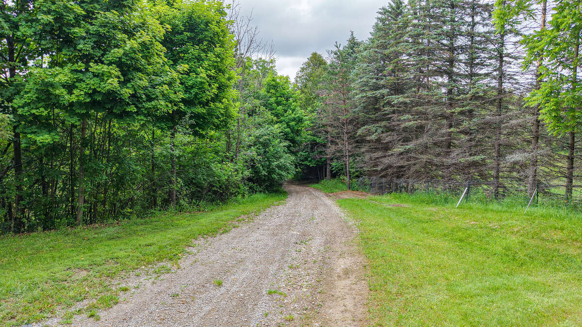 13 Acres with large farm house