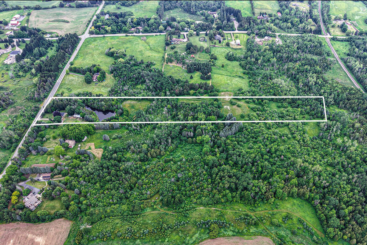 13 Acres with large farm house