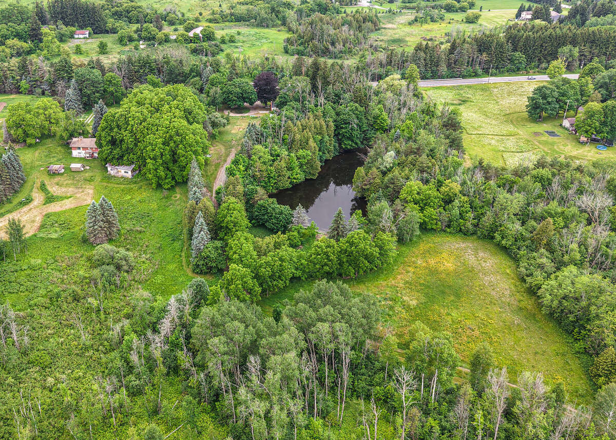 13 Acres with large farm house