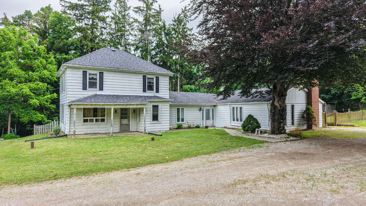 13 Acres with large farm house