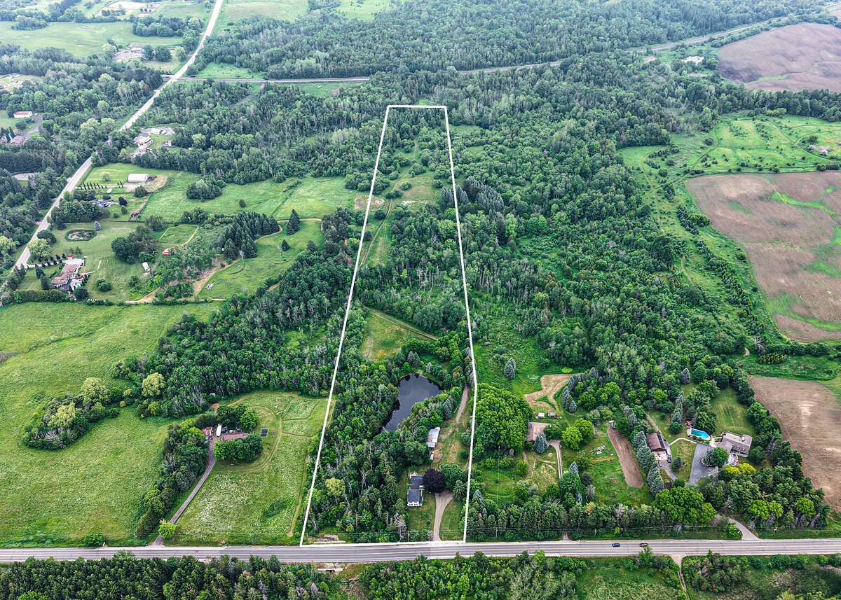 13 Acres with large farm house