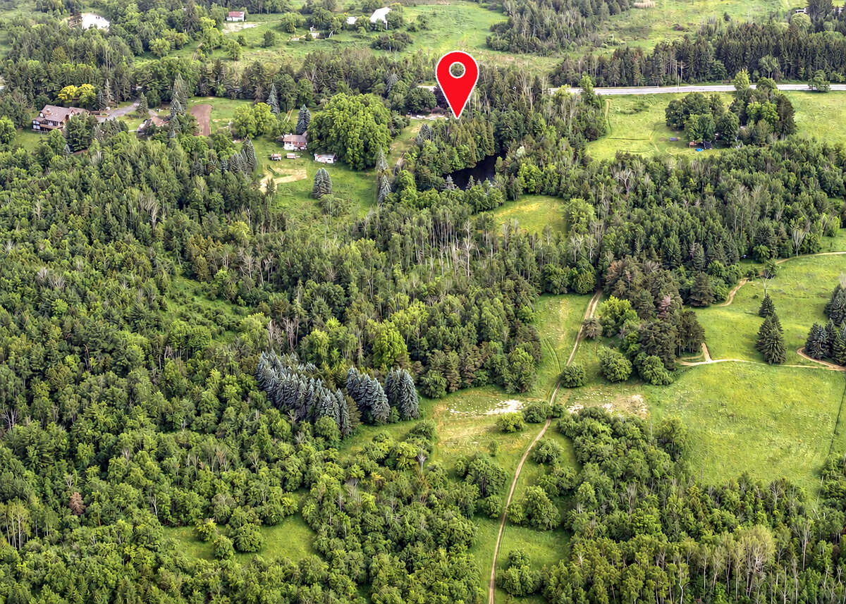 13 Acres with large farm house
