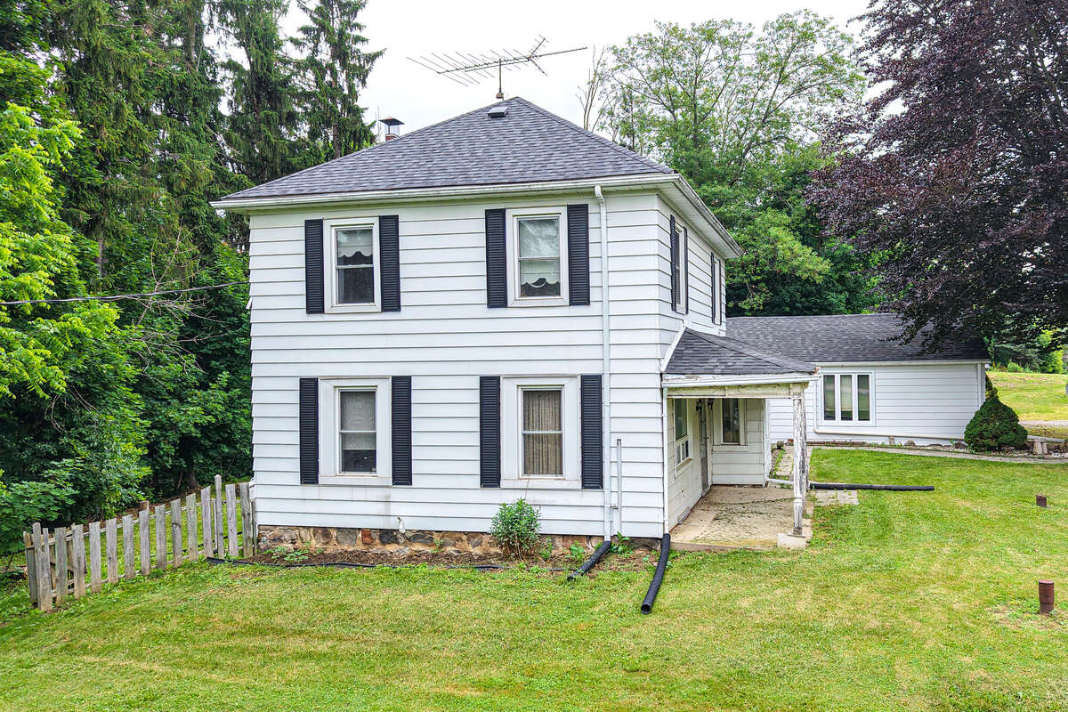 13 Acres with large farm house