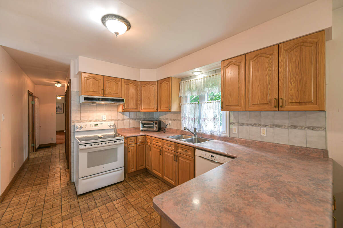 13 Acres with large farm house