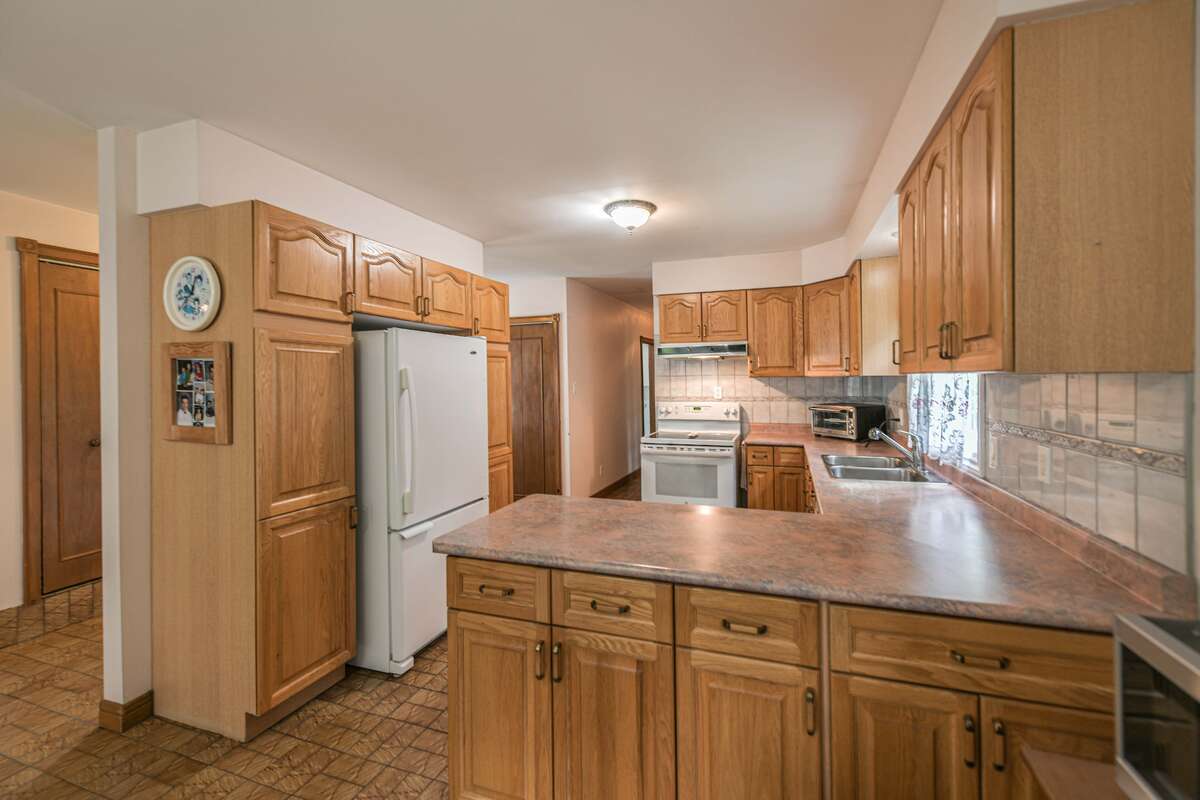 13 Acres with large farm house