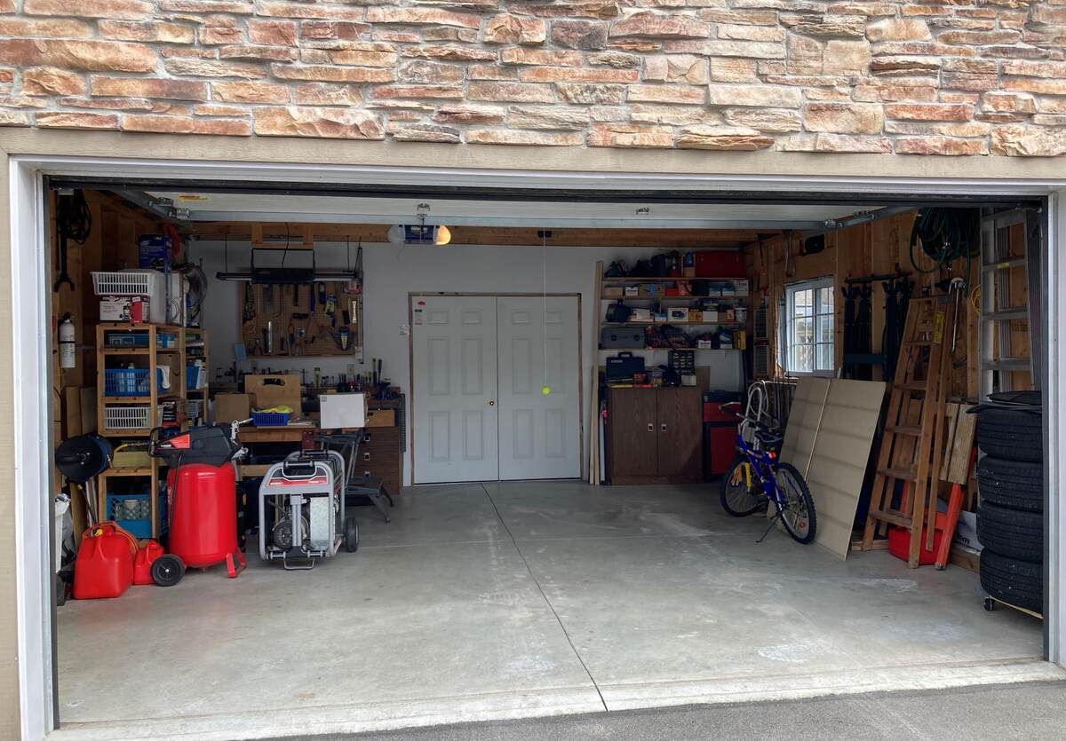 Garage with 72" interior entry door into heated shop/studio