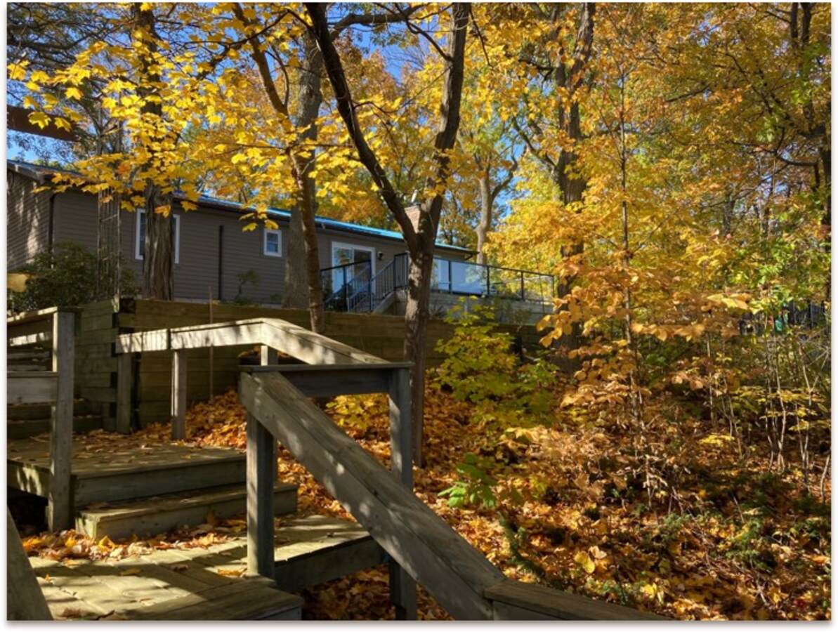 Rear view of house from stairs to waterfront