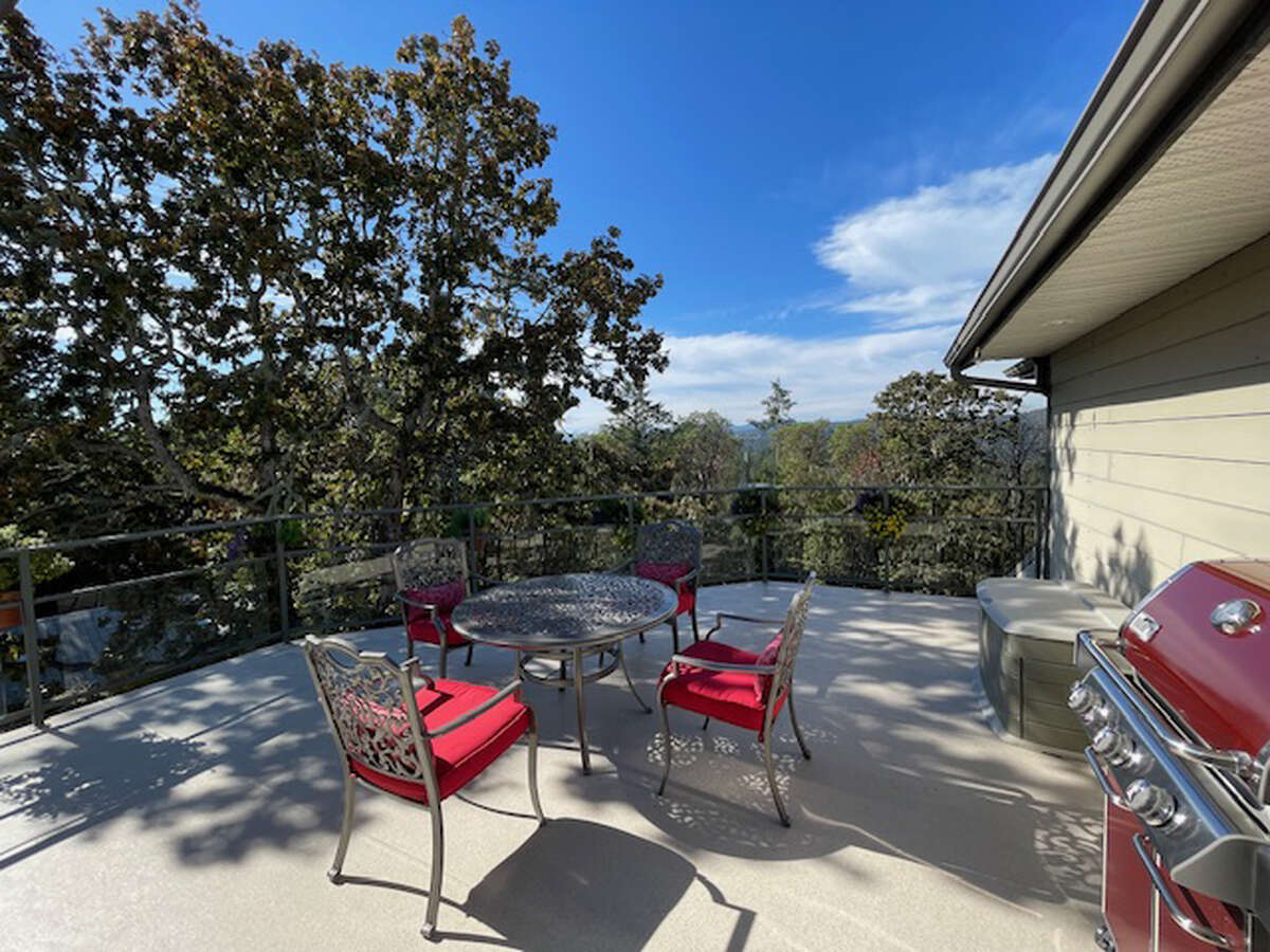 West deck - perfect for entertaining in the evening - may be enclosed with shade fabric in summer