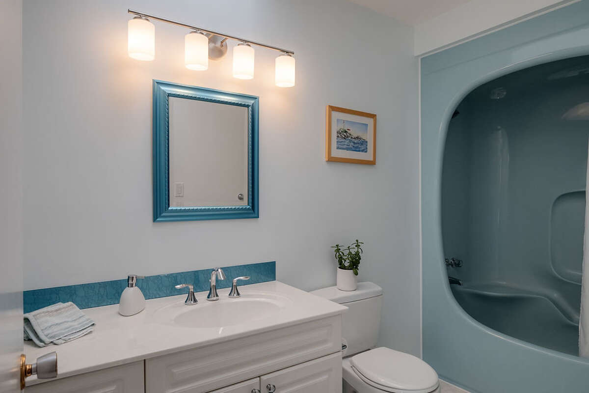Family bathroom with really cool tub-shower